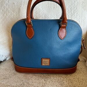 Dooney & Bourke blue pebble with brown trim leather purse.
